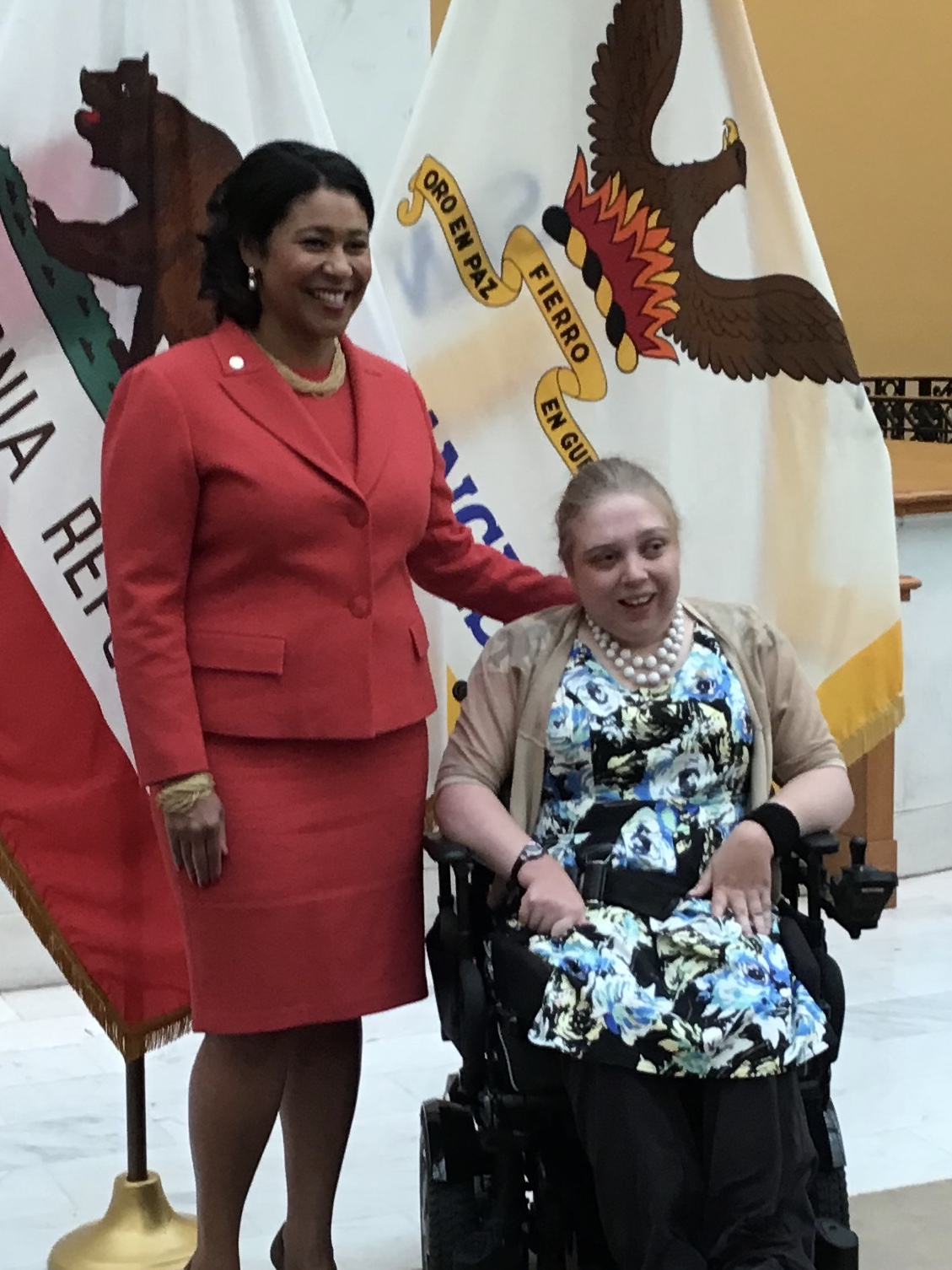 Mayor London Breed standing next to Lily Marshall-Fricker