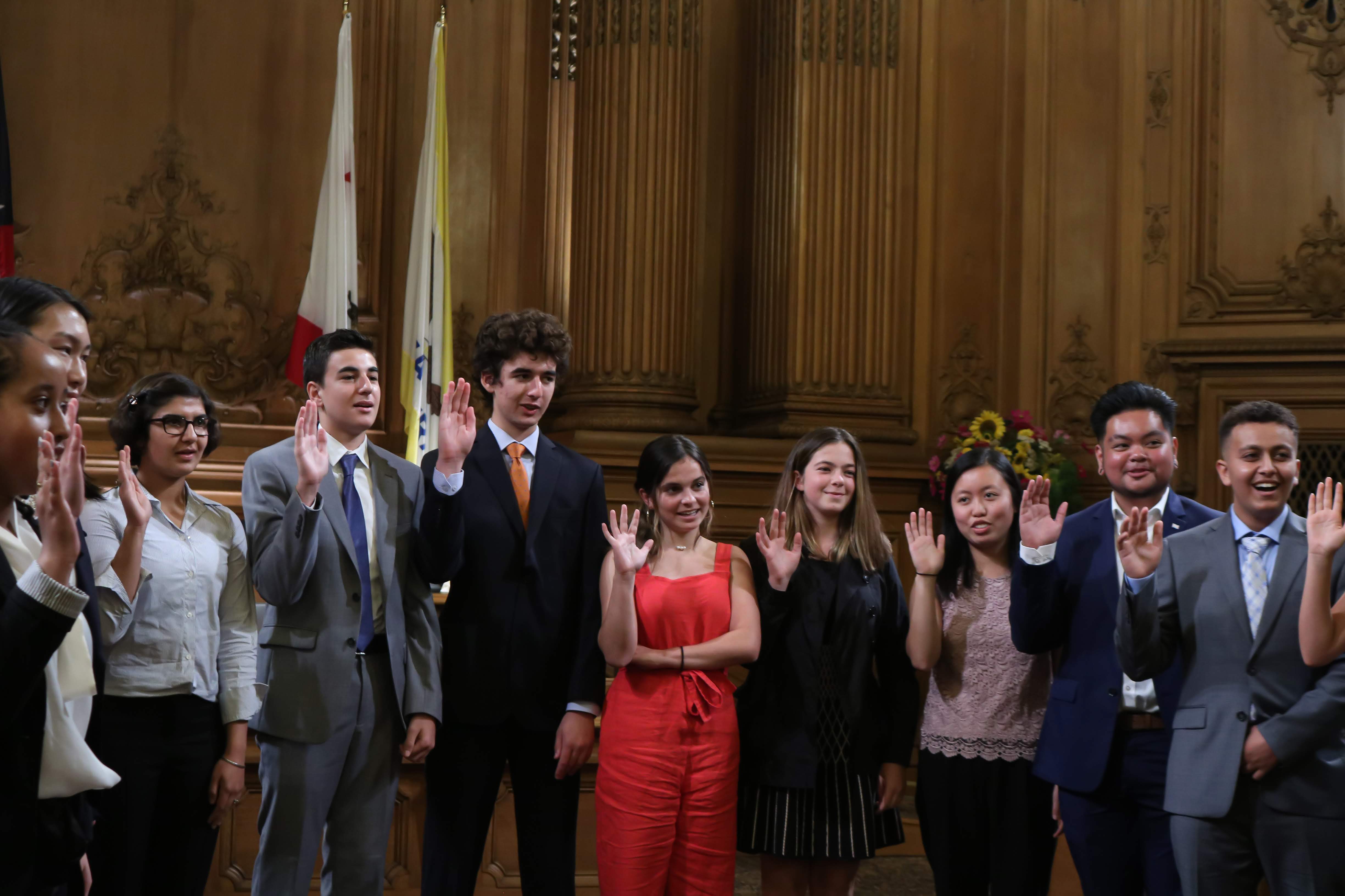 image of Youth Commissioners conducting their oath in the Board Chambers